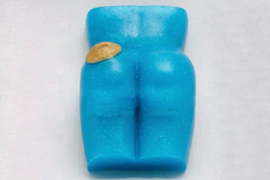 A blue condom with the shape of an erection.