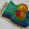 A cake that looks like an orange and blue bra.