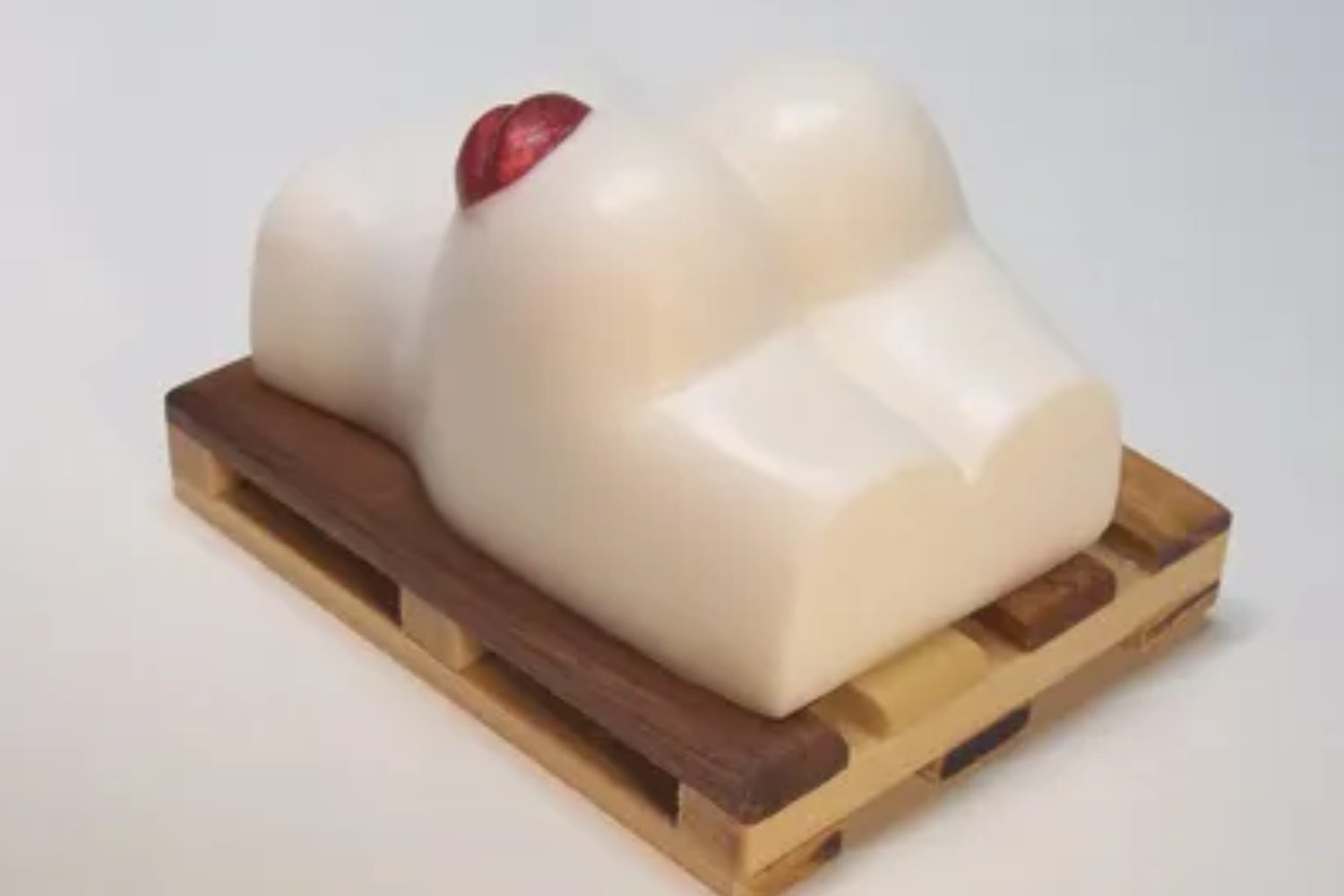 A soap on top of a wooden pallet.