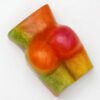 A piece of fruit is sitting on top of the table.