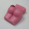 A pink soap shaped like a woman 's butt.