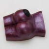 A purple object is sitting on top of the table.