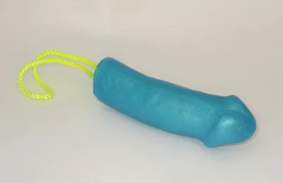 A blue toy with yellow string attached to it.
