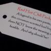 A red hot chili pepper tag with the words " red hot chili pecker ".