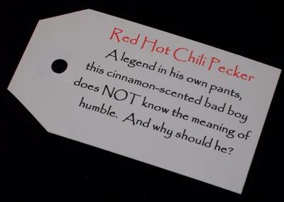 A red hot chili pepper tag with the words " red hot chili pecker ".