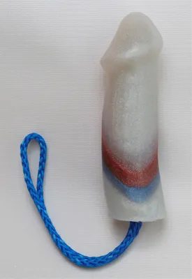 A blue rope and a white tube with red, white and blue stripes.