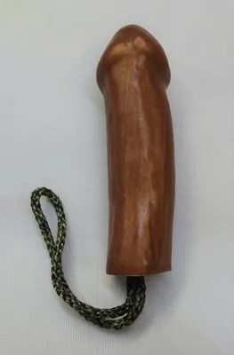 A wooden handle with a rope attached to it.
