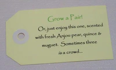 A card with the words grow a pair on it.