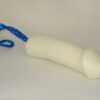A white toy with blue string attached to it.