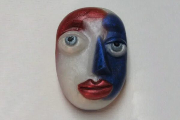 A red white and blue face with eyes