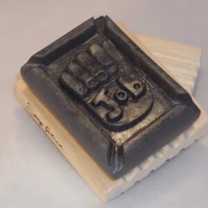 A soap stamp with the number 3 5 on it.