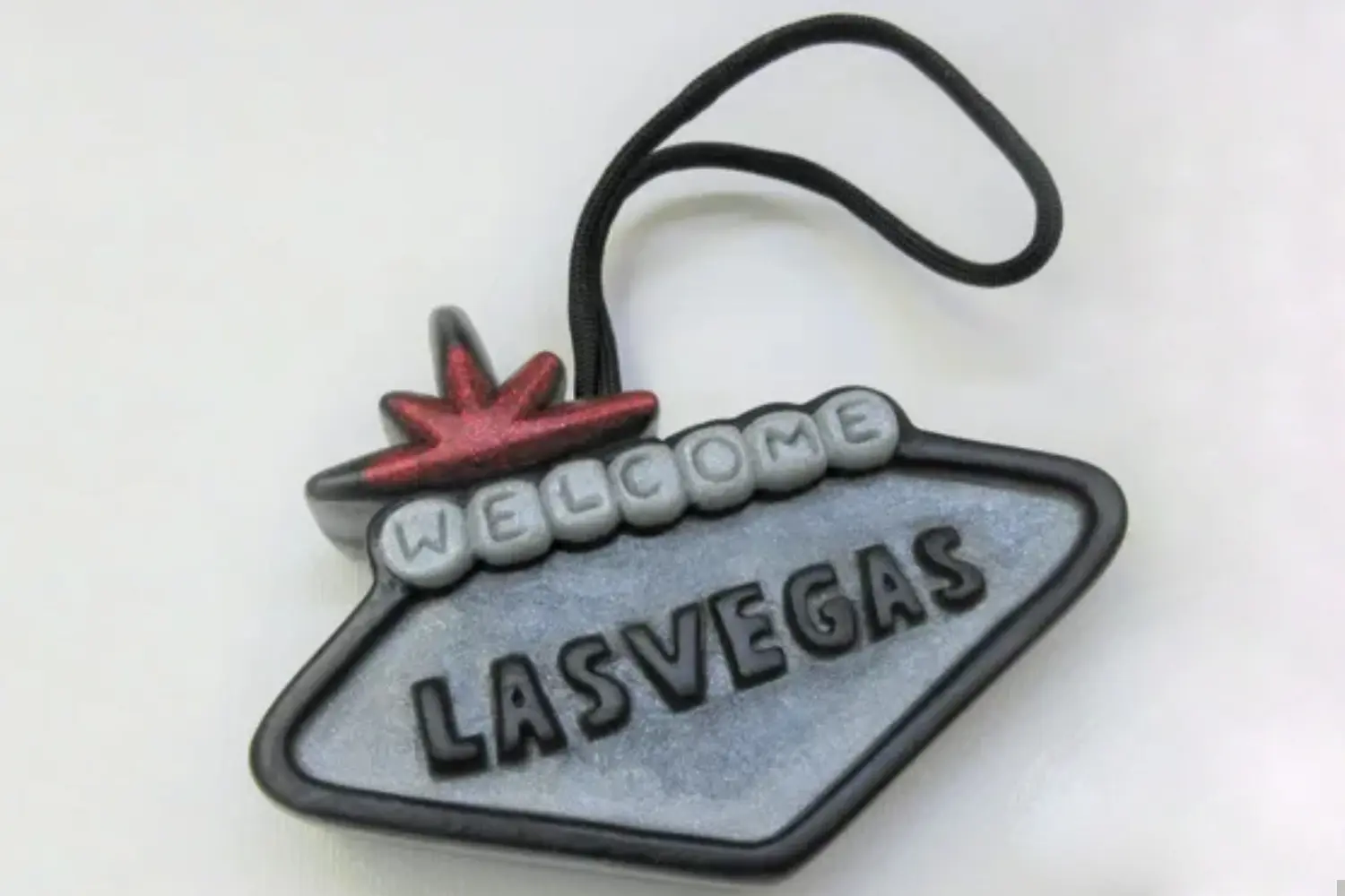 A las vegas sign with the word " welcome " on it.
