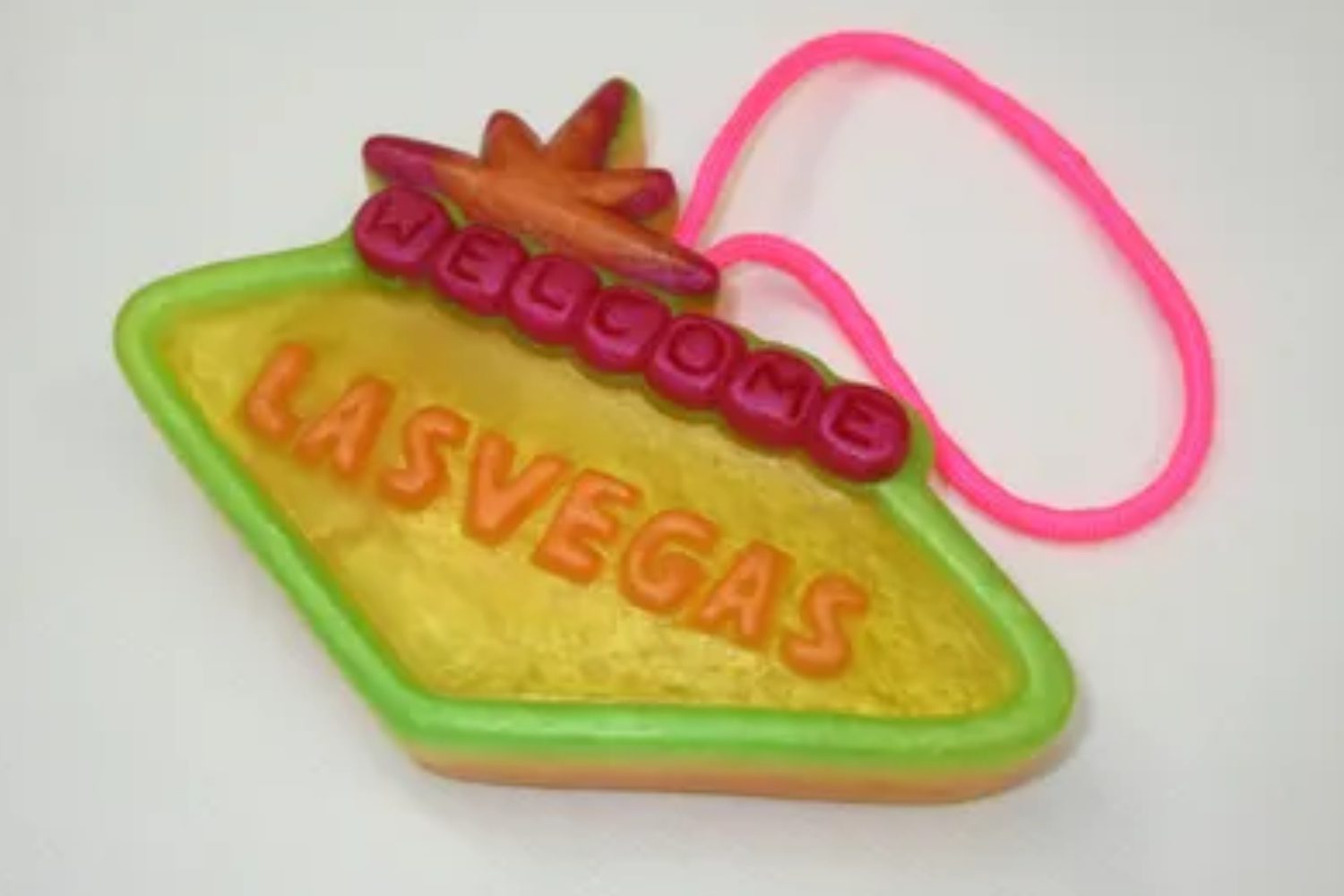 A neon sign with the word las vegas written on it.