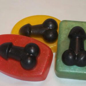 Three different colored soaps with black knobs on them.