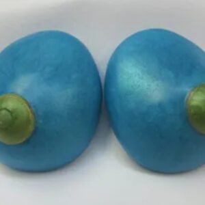 A pair of blue eggs with green tops.
