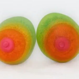 Two green and orange eggs with a pink top.
