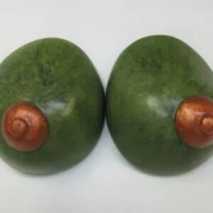 Two avocados with a spiral on them.
