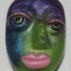 A green and blue face with pink lips