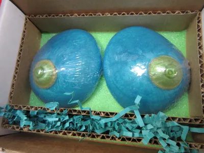 A box of blue balloons with gold accents.