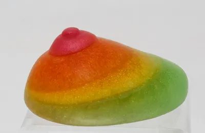 A close up of the top of a fruit jelly