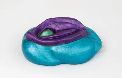 A blue and purple object sitting on top of a table.