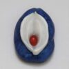A blue and white object with red seed inside.