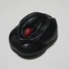 A black mouse with red button on it.