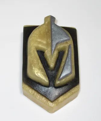 A close up of the vegas golden knights logo.