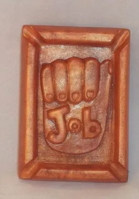 A rectangular plaque with the word " job " in it.