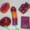 A variety of soap toys are displayed on the table.