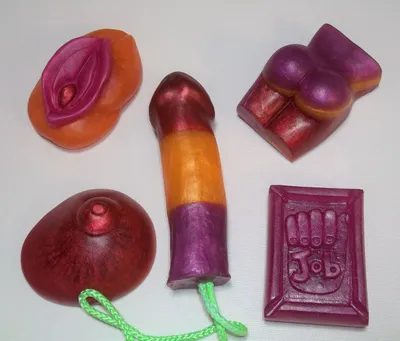 A variety of soap toys are displayed on the table.