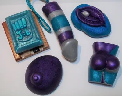 A group of purple and blue objects on top of a table.