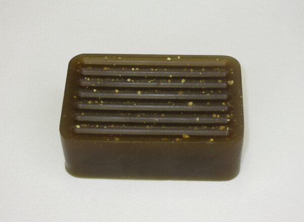 A soap bar with some brown and gold stripes