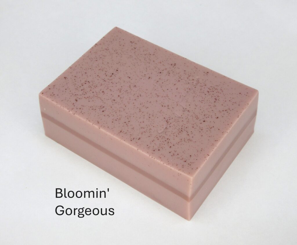 Pink rectangular box with speckled surface.